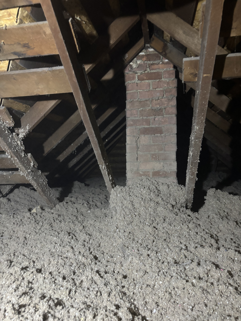 cell-2 Cellulose Insulation inside attic with chimney