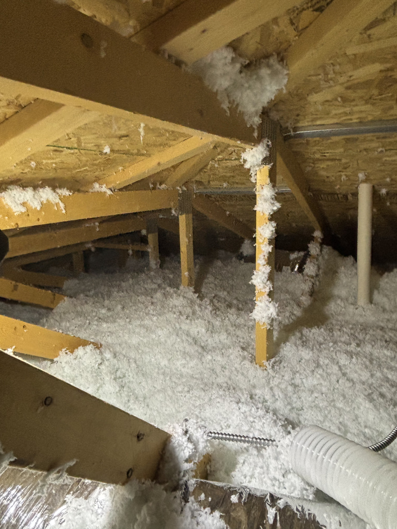 fiberglass-insulation-attact-closeup Fiberglass Insulation inside attic close up